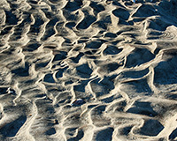 patterns left in sand after receeding tide