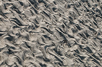 patterns left in sand after receeding tide